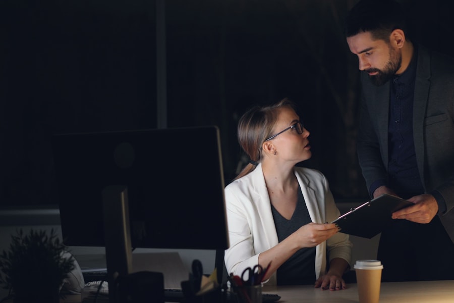 Two colleagues working together at an office