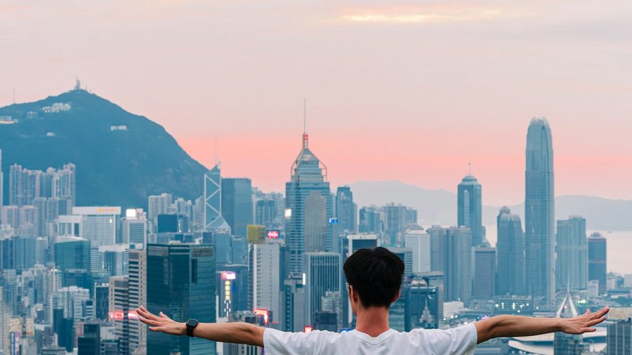 A man overlooking a city skyline