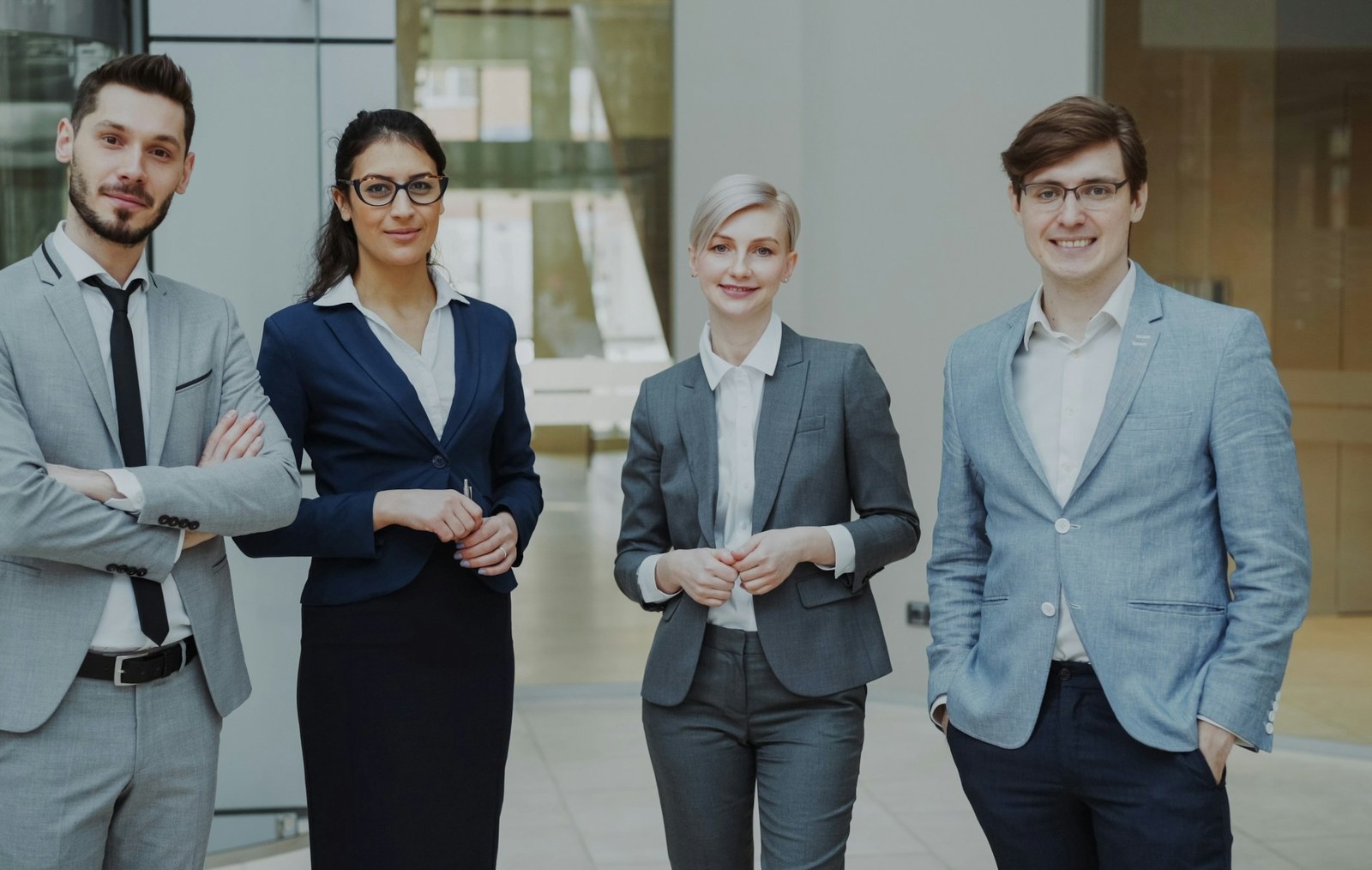 Professionals standing together in an office